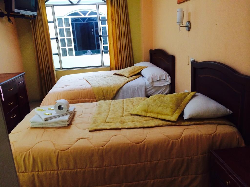 Hostal Grand Rio Baños Rum bild
